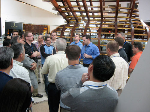 Wayne Gaw, P.E. (center of photo, blue shirt) of WSP Flack + Kurtz (San Francisco) leads a group of Summit attendees on a tour of Crystals, the retail and entertainment district at CityCenter in Las Vegas.