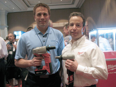 Uponor executive vice president Anders Tollsten (left) and Milwaukee Electric Tool president Steve Richman.