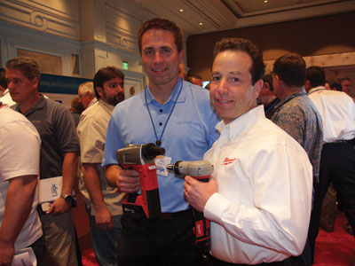 Uponor executive vice president Anders Tollsten (left) and Milwaukee Electric Tool president Steve Richman